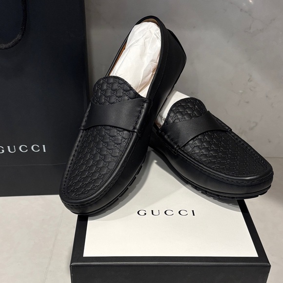 Gucci Men's Embossed Black Slip-On Loafers - Picture 1 of 3